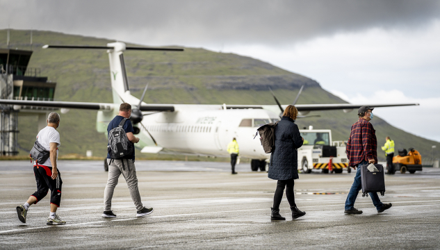 ferðafólk, ferðavinna, flogvøllurin